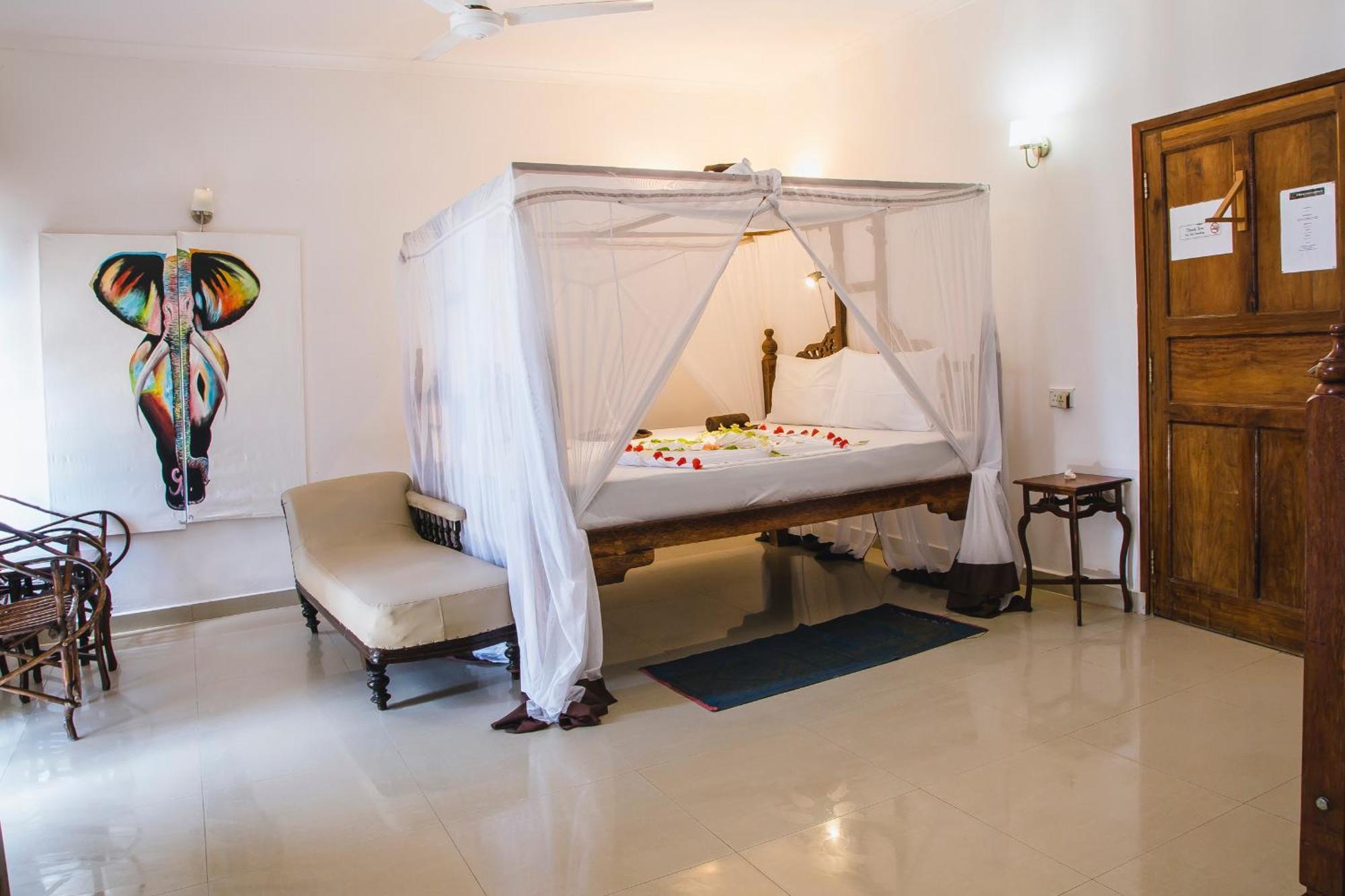 Moonshine Uroa Boutique Hotel Quarto foto