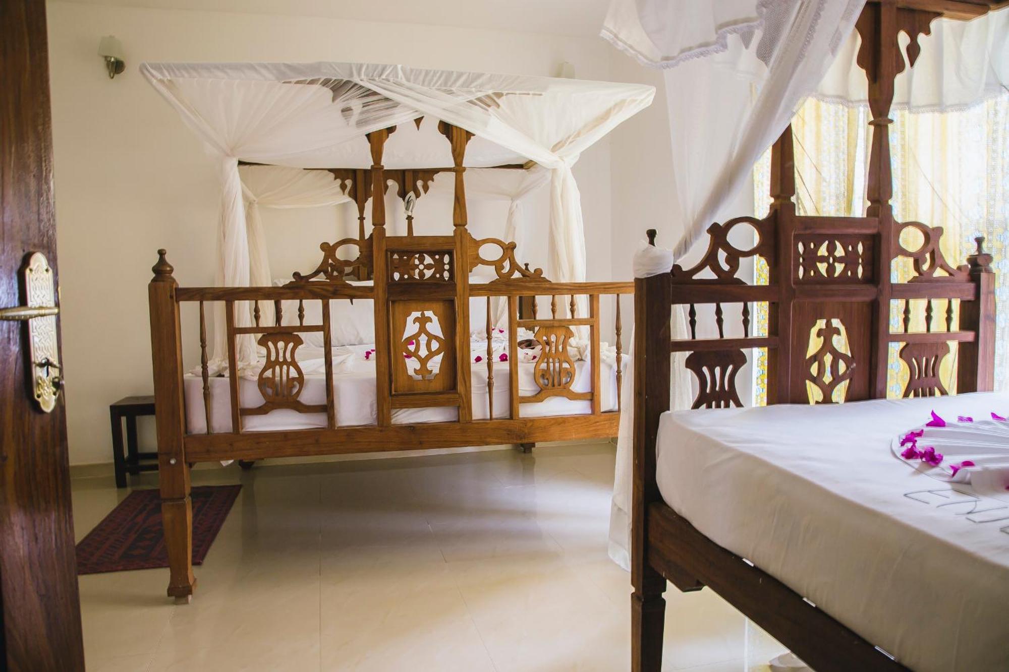 Moonshine Uroa Boutique Hotel Quarto foto